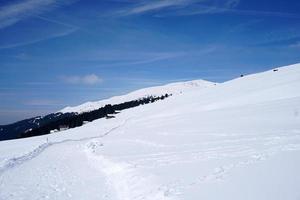 snow trekking in dolomites mountains photo