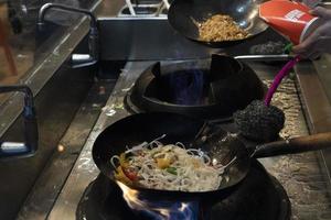 wok rice spaghetti cooking photo