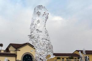 water spurt detail isolated on sky photo