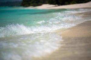 waves on the shore Maldives sandy beach cristal water landscape photo