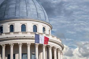 Paris pantheon capitol with french flag photo