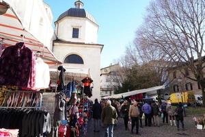 TRENTO, ITALY - DECEMBER 9, 2017 - People at traditional christmas market photo