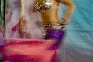 Oriental belly dancer beutiful move photo