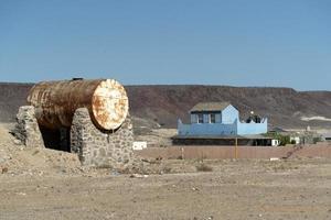 Old tank water in San Juanico village Baja California Sur Mexico photo