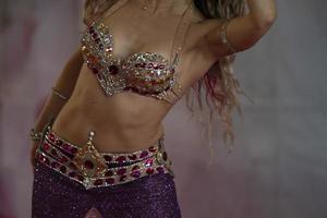 Oriental belly dancer beutiful move photo