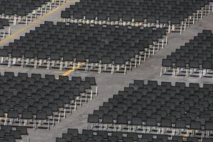 Many empty chairs without audience photo