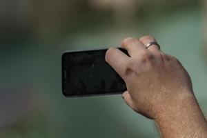 selfie remote control on cellular smartphone photo