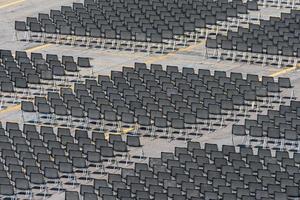 Many empty chairs without audience photo