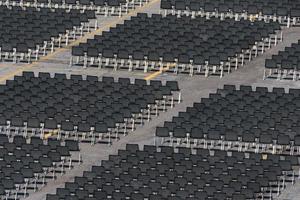 Many empty chairs without audience photo