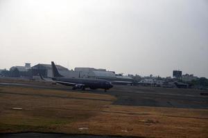 PARIS, FRANCE - MARCH 6 2018  - paris airport landing and loading cargo and passenger photo