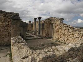 Volubilis Roman ruins in Morocco- Best-preserved Roman ruins located between the Imperial Cities of Fez and Meknes photo