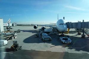 PARIS, FRANCE - MARCH 6 2018  - paris airport landing and loading cargo and passenger photo