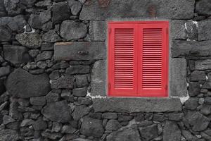 Lajido village Pico Island Azores black lava houses red windows photo