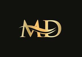 Gold MD letter logo design. MD logo design with creative and modern trendy vector