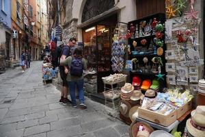 PORTOVENERE, ITALY - SEPTEMBER 24 2017 - Many Tourists in pictoresque italian village photo