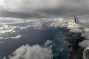 genoa aerial view before landing on cloudy day photo