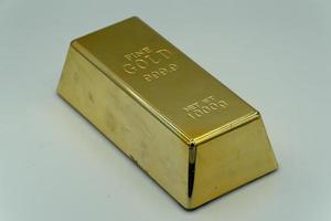 Gold ingot isolated photo