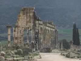 Volubilis Roman ruins in Morocco- Best-preserved Roman ruins located between the Imperial Cities of Fez and Meknes photo
