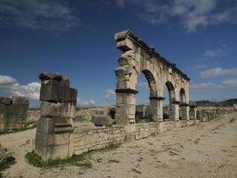 Volubilis Roman ruins in Morocco- Best-preserved Roman ruins located between the Imperial Cities of Fez and Meknes photo