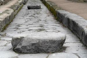 pompei ruins roman path street pedestrian walk photo