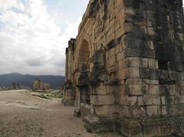 Volubilis Roman ruins in Morocco- Best-preserved Roman ruins located between the Imperial Cities of Fez and Meknes photo