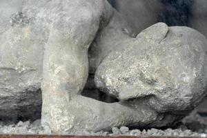 NAPLES, ITALY - FEBRUARY 1 2020 - pompei ruins statue buried corpse photo