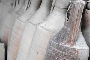 Roman amphora detail close up photo