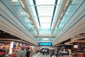 DUBAI, UAE - SEPTEMBER 4 2017 - Travellers at Dubai Airport photo