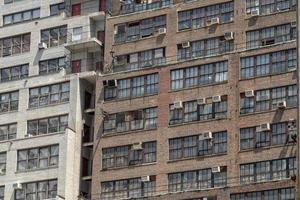 new york manhattan condos old windows and ac machines photo