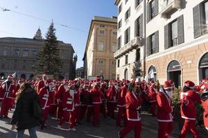 GENOA, ITALY - DECEMBER 22 2019 - Traditional Santa claus walk photo