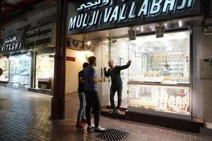 DUBAI, UAE - SEPTEMBER 3 2017 - The gold souk market at night photo