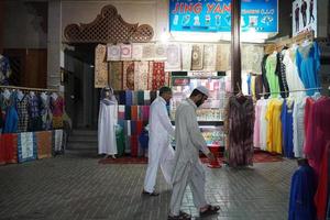 DUBAI, UAE - SEPTEMBER 3 2017 - The gold souk market at night photo