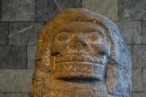 MEXICO CITY, MEXICO - JANUARY 31 2019 - mexico city anthropology museum death head statue photo