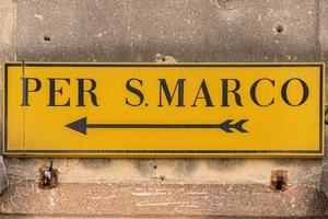 Venice San marco yellow street sign photo