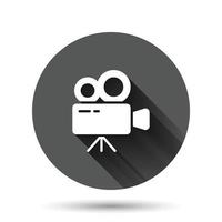 Projector icon in flat style. Cinema camera vector illustration on black round background with long shadow effect. Movie circle button business concept.