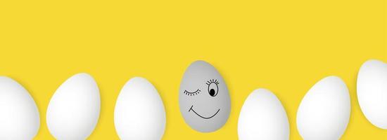 Painted gray egg between white eggs on a yellow background vector