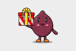 Cute cartoon Sweet potato character hold gift box vector