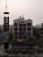 Sun Shining through Metal Wind Chimes. Evening, Sunset Mumbai, India. photo