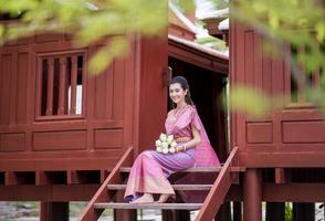 Beautiful Thai girl in Thai traditional costume photo