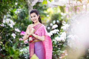 Beautiful Thai girl in Thai traditional costume photo