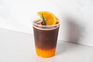 espresso with orange juice in glass photo