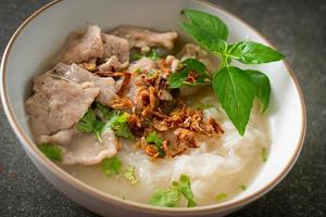 Pho Bo vietnamese soup with pork and rice noodles photo