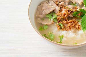 Pho Bo vietnamese soup with pork and rice noodles photo