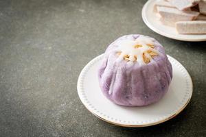 taro bun with white sugar cream and nut photo