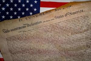 Declaration of independence 4th july 1776 on usa flag photo