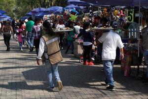 MEXICO CITY, FEBRUARY 3 2019 - Town park Chapultepec crowded of people on sunday photo