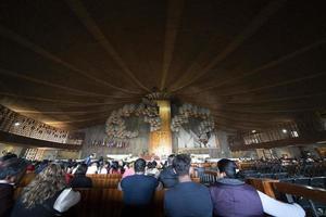 MEXICO CITY, MEXICO - JANUARY 30 2019 - Pilgrims at Guadalupe Cathedral photo