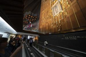 MEXICO CITY, MEXICO - JANUARY 30 2019 - Pilgrims at Guadalupe Cathedral photo