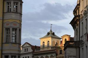 prague old buildings at sunset photo