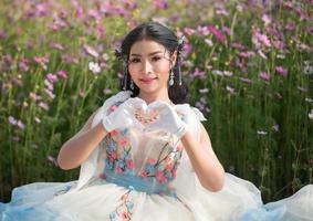 Young woman on a summer field. photo